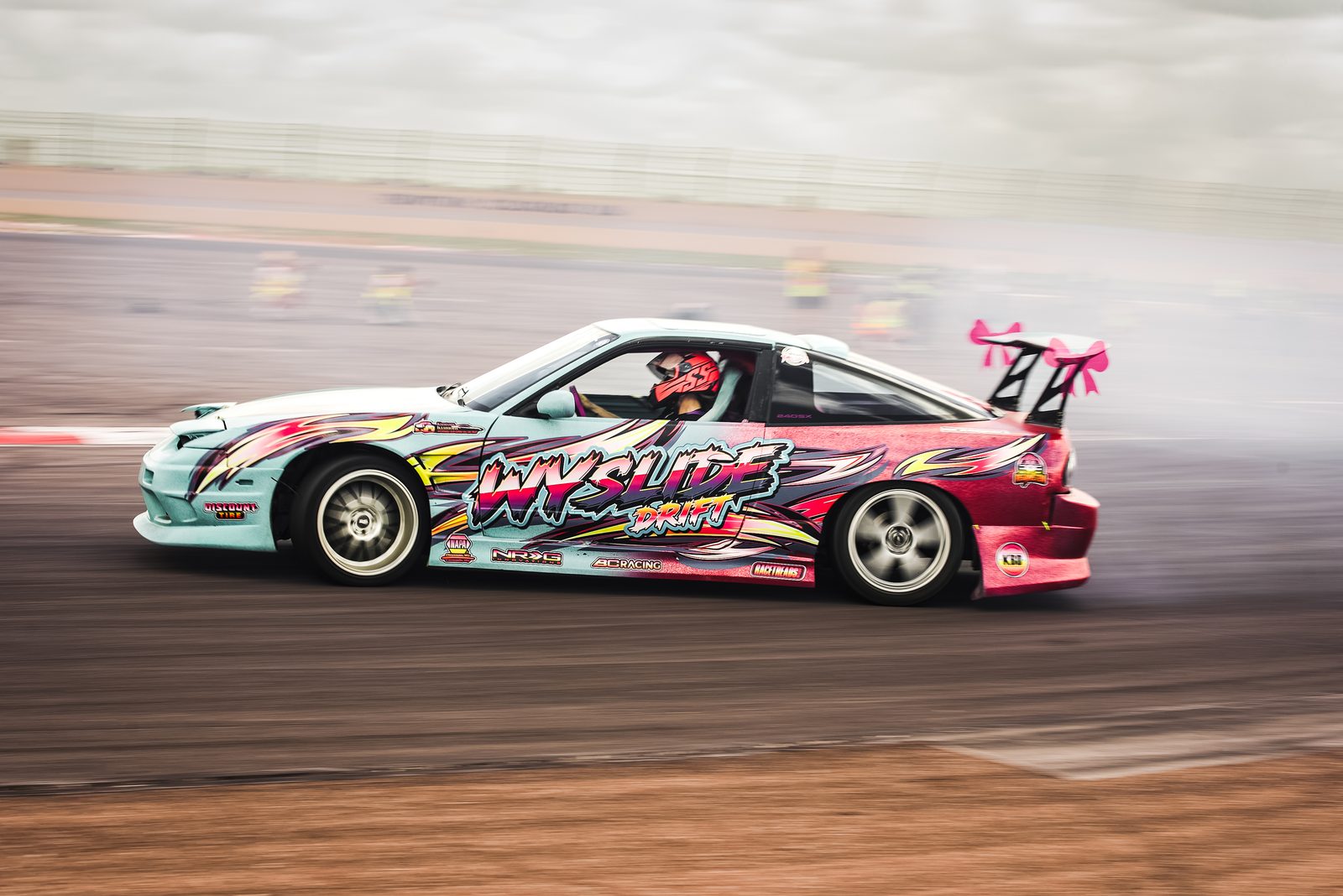Nissan 240SX drift car sliding on track