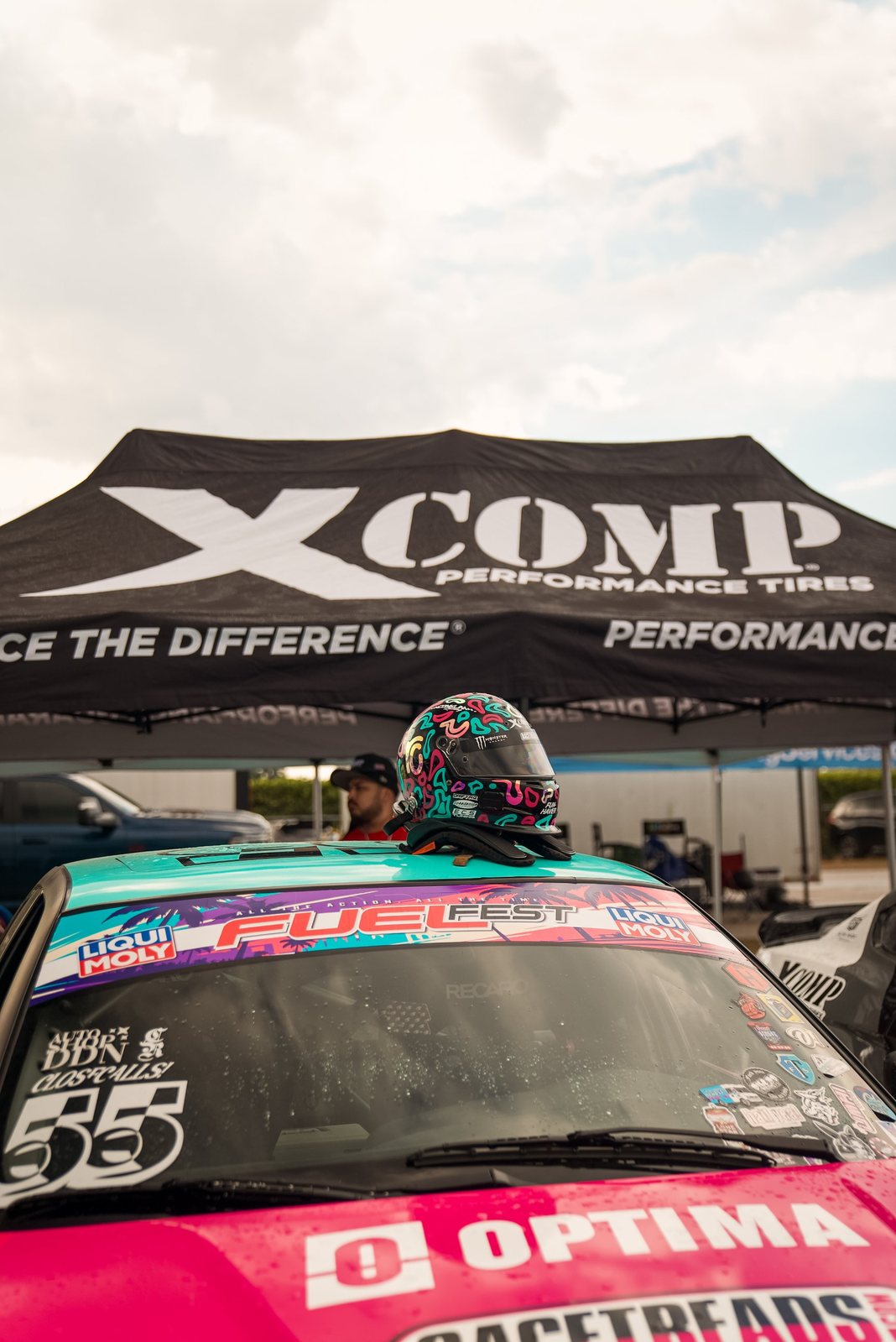 Drift helmet on a Fuelfest car under the XCOMP Performance Tires tent